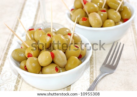 green olives, stuffed with red peppers