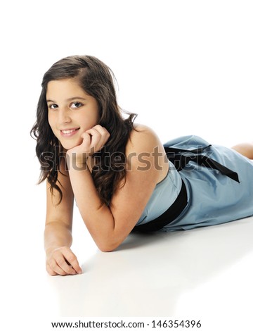 A Beautiful Young Teen Happily Relaxed In Her Blue Strapless Dress On ...