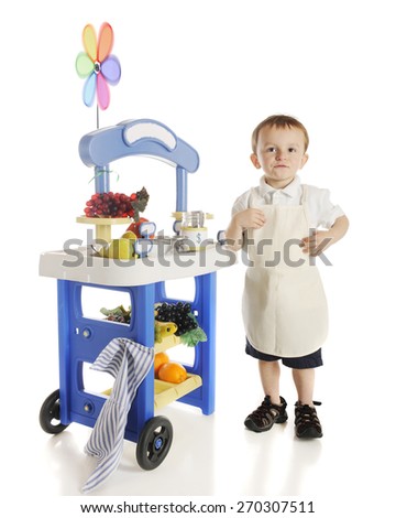 A preschool vendor standing by his fruit stand.  The stand\'s signs are left f blank for your text.  On a white background.