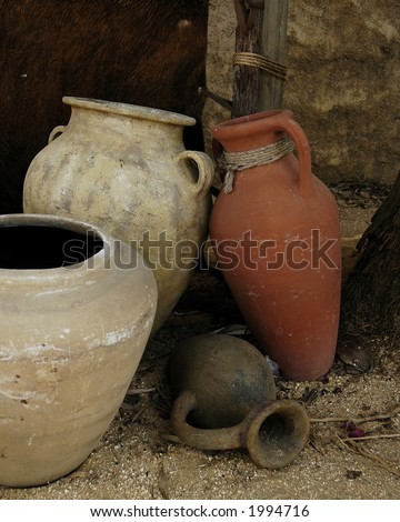 Still  life of four clay pots representing those of ancient days.  (Replicas)