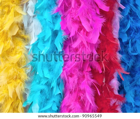 Multicolored feather boas for fancy dress costume.