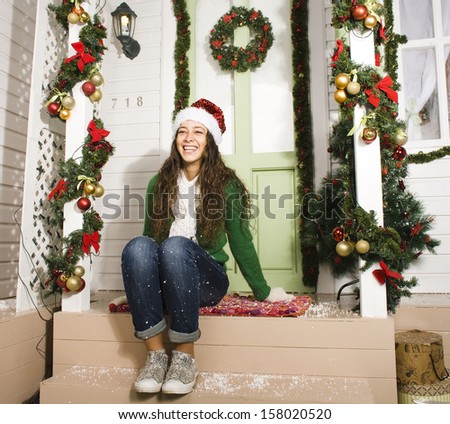 happy young girl at home decorated on Christmas