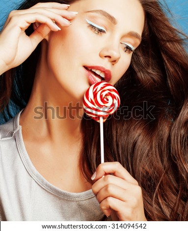 young pretty adorable woman with candy close up like doll makeup