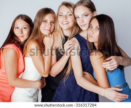 many girlfriends hugging celebration on white background, smiling talking chat, girl next door close up