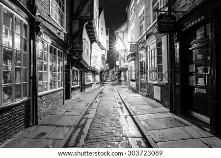 YORK, UK - August 05: The Shambles is a former butchers\' street in York with some buildings dating back from the fourteenth century. August 05, 2015 in York.