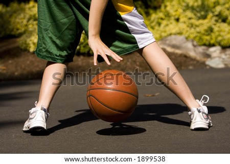 Female Dribbling a Basketball