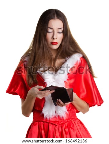 beautiful girl with long brown hair in red christmas dress holding  empty purse on white background