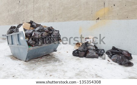 Sacks of garbage in a container