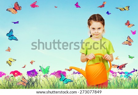 Little girl with a watering can against the bright nature background