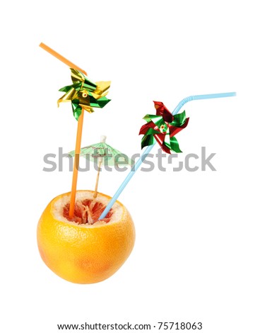 Fresh and juicy grapefruit  with pipes for drinking juice