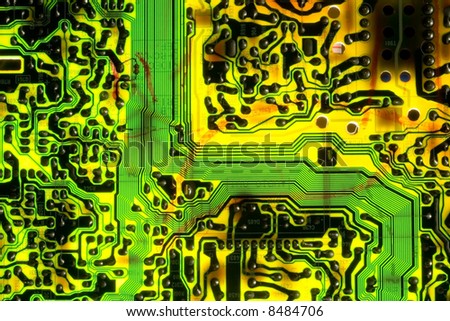 Electronic circuit board background showing wires and microchips