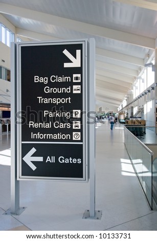 Direction Signs In An Airport Terminal For Travelers Stock Photo ...