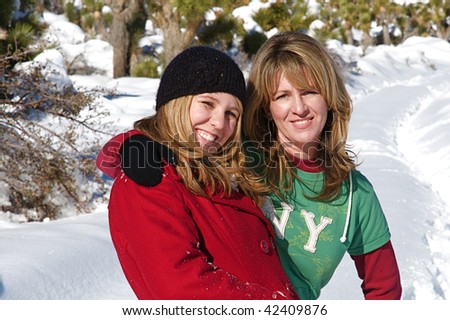 Young people enjoy a fresh snow fall