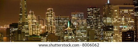 San Francisco Financial District Buildings lit up for Christmas. Panoramic composition.