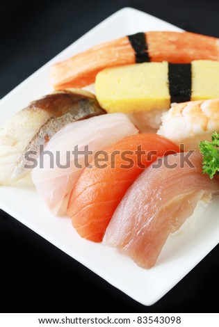 sushi of raw fish, grill fish, egg and crab stick