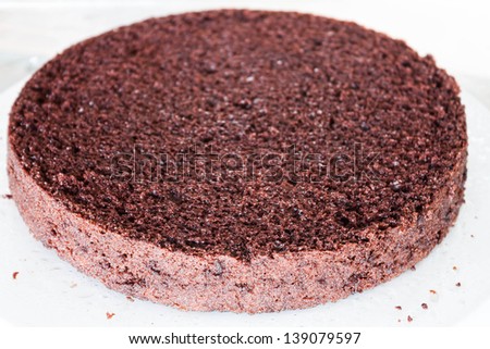 Bottom part of chiffon chocolate cake sprayed rum