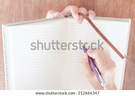 Woman pay attention of writing, stock photo