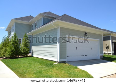 Brand New Suburban American House with Attached Two-Car Garage