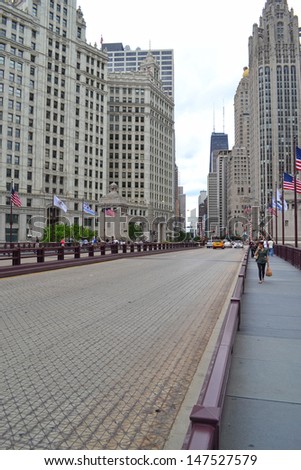 CHICAGO - JUNE 14: Michigan Avenue Bridge over the Chicago River on June 14, 2011 in Chicago, Illinois. Michigan Avenue is also known as the 