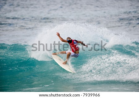 professional surfer in Pipeline masters contest (for editorial use only)