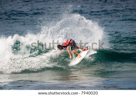 professional surfer in Pipeline masters contest (for editorial use only)