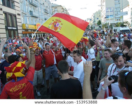 KIEV, UKRAINE Â?Â? 01 JULY 2012: The crowd of Spanish football national team fans celebrates on Euro-2012 on July 01, 2012 in Kiev, Ukraine.