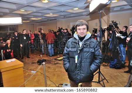 KIEV, UKRAINE Ã¢Â?Â? 2 DECEMBER 2013: The manager of Ukrainian oppositions united staff M.Pleshko organizes a briefing with journalists devoted to revolution on December 2, 2013 in Kiev, Ukraine