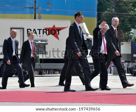 KIEV, UKRAINE - 08 JUNE 2014: The President of Austria Heinz Fischer with security visit the inauguration of Ukrainian President Petro Poroshenko on June 08, 2014 in Kiev, Ukraine