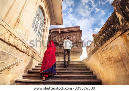 JODHPUR, RAJASTHAN, INDIA - MARCH 08, 2015: Indian family with baby going to Mehrangarh fort museum