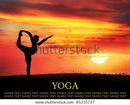 Yoga Natarajasana dancer balancing pose by Man in silhouette with dramatic sunset sky background. Free space for text