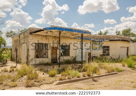 Neglected automotive repair shop and gas station tried selling auto parts before it was abandoned on Route 66