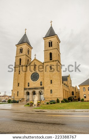 German and German Russian Catholics erected St. Fidelis Church from 1908-1911 using native limestone.  It is now in the National Register of Historic Places for its architectural significance.