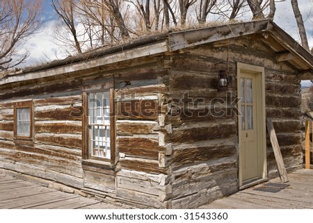 Log cabin with lantern in the Montana ghost town of Nevada City