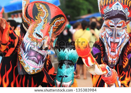 LOEI, THAILAND - : Phi Ta Khon Festival on June in Loei, Thailand. Young people dress in spirit and wear a mask, sing and dance
