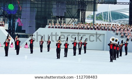 SINGAPORE - AUGUST 9: Military band performing on stage during National Day Parade Singapore 2012 on August 9, 2012 in Singapore.
