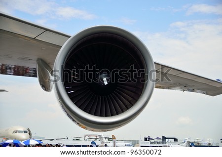 SINGAPORE - FEBRUARY 17: Side profile of Singapore Airlines\' (SIA) Boeing 747-400 jet engine at Singapore Airshow on February 17, 2012 in Singapore
