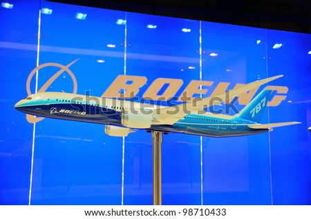 SINGAPORE - FEBRUARY 17: Model of Boeing 787-900 twin engine jetliner on display at Singapore Airshow February 17, 2012 in Singapore