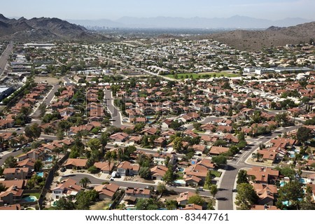 Red Roofs and Swimming Pools against the Phoenix, Arizona Skyline