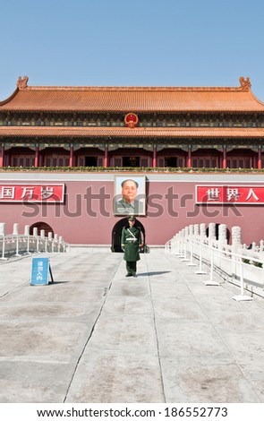 BEIJING, CHINA - MARCH 27: Chinese soldier stands at attention in front of Gate of Heavenly Peace (Tiananmen) on March 27, 2013 in Beijing