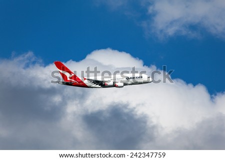 MELBOURNE - JANUARY 14: A Qantas A380 is seen banking over Keilor with beautiful clouds in the background after departure from Melbourne airport on January 14, 2011.