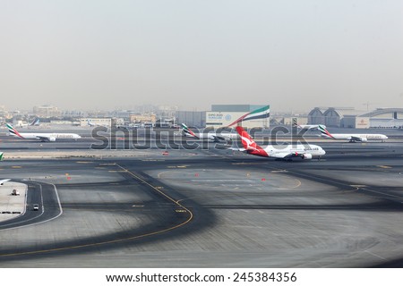 DUBAI - JANUARY 9: Rush hour and long queue in Dubai International Airport as seen on January 9, 2015.