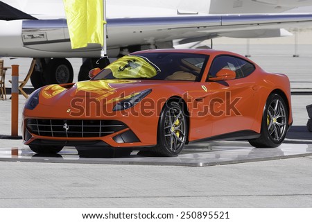 DUBAI - DECEMBER 8: A luxury car on display at the DWC airport as seen on December 8, 2014. DWC is Dubai\'s newest airport.
