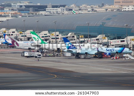 DUBAI - FEBRUARY 28: Few international airliners are seen here parking at the gate on February 28, 2013 at Dubai international airport, terminal 1.