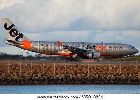 SYDNEY - JULY 11: A Jetstar Airline A330 is seen here in Sydney airport taking off as seen on July 11, 2013.