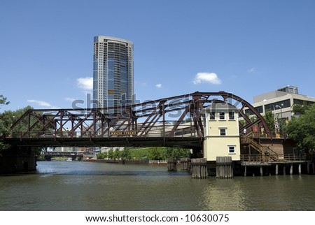 The Kinzie Street bridge across the north branch of the Chicago River in downtown Chicago, Illinois. The first bridge across the Chicago River was constructed near this site in 1832.