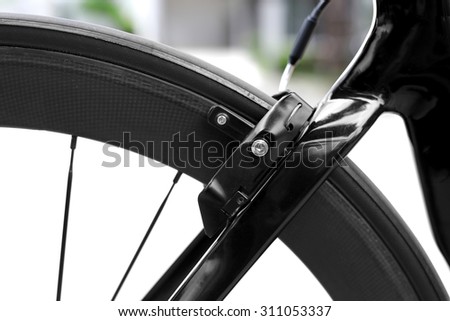 Front bicycle break with carbon fiber wheel