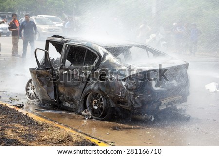 THAILAND- 24 May : Car fire due to a gas explosion. Be car crash. The damaged on car and driver died in car. On the Highway No.4 (Phet Kasem road). May 24,2015 in nakhon pathom province,thailand