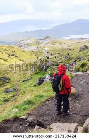 Hiking on crutches on a hill in Scotland named \
