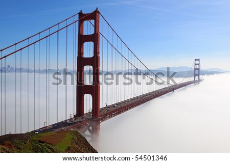 Golden Gate Bridge is shown in a fog   , San Francisco, California