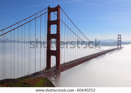 Golden Gate Bridge is shown in a fog , San Francisco, California